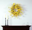23" Green and Yellow Artificial Spring Daisy Wreath